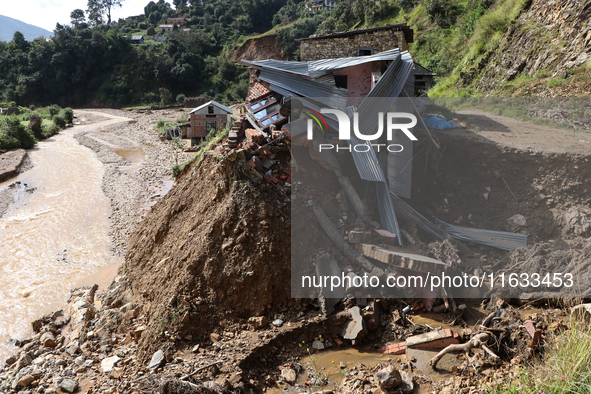 A view of the house damaged by the flood due to heavy rain in a village in Lalitpur district on the outskirts of Kathmandu, Nepal, on Octobe...