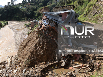 A view of the house damaged by the flood due to heavy rain in a village in Lalitpur district on the outskirts of Kathmandu, Nepal, on Octobe...