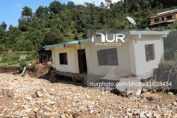 A view of the house damaged by the flood due to heavy rain in a village in Lalitpur district on the outskirts of Kathmandu, Nepal, on Octobe...