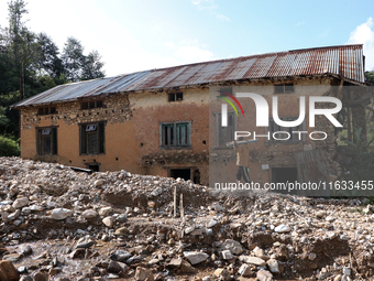 A view of the house damaged by the flood due to heavy rain in a village in Lalitpur district on the outskirts of Kathmandu, Nepal, on Octobe...