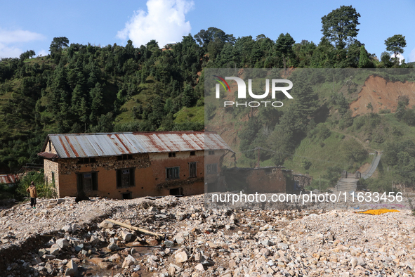 A view of the house damaged by the flood due to heavy rain in a village in Lalitpur district on the outskirts of Kathmandu, Nepal, on Octobe...