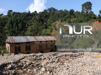 A view of the house damaged by the flood due to heavy rain in a village in Lalitpur district on the outskirts of Kathmandu, Nepal, on Octobe...