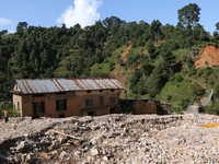 A view of the house damaged by the flood due to heavy rain in a village in Lalitpur district on the outskirts of Kathmandu, Nepal, on Octobe...