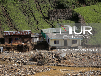 A view of the house damaged by the flood due to heavy rain in a village in Lalitpur district on the outskirts of Kathmandu, Nepal, on Octobe...