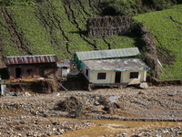 A view of the house damaged by the flood due to heavy rain in a village in Lalitpur district on the outskirts of Kathmandu, Nepal, on Octobe...