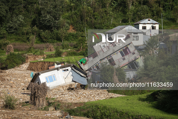 A view of the house damaged by the flood due to heavy rain in a village in Lalitpur district on the outskirts of Kathmandu, Nepal, on Octobe...