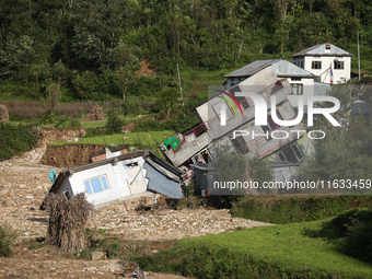 A view of the house damaged by the flood due to heavy rain in a village in Lalitpur district on the outskirts of Kathmandu, Nepal, on Octobe...