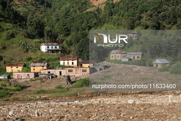 A view of the house damaged by the flood due to heavy rain in a village in Lalitpur district on the outskirts of Kathmandu, Nepal, on Octobe...