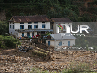 A view of the house damaged by the flood due to heavy rain in a village in Lalitpur district on the outskirts of Kathmandu, Nepal, on Octobe...