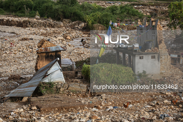 A view of the house damaged by the flood due to heavy rain in a village in Lalitpur district on the outskirts of Kathmandu, Nepal, on Octobe...