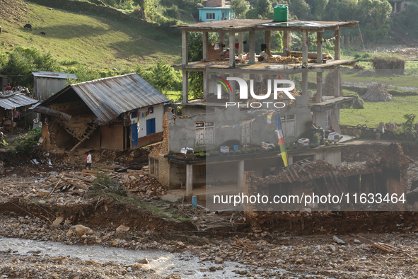 A view of the house damaged by the flood due to heavy rain in a village in Lalitpur district on the outskirts of Kathmandu, Nepal, on Octobe...