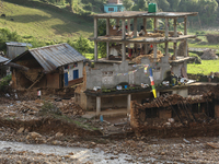 A view of the house damaged by the flood due to heavy rain in a village in Lalitpur district on the outskirts of Kathmandu, Nepal, on Octobe...