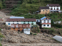 A view of the house damaged by the flood due to heavy rain in a village in Lalitpur district on the outskirts of Kathmandu, Nepal, on Octobe...