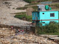 A view of the house damaged by the flood due to heavy rain in a village in Lalitpur district on the outskirts of Kathmandu, Nepal, on Octobe...