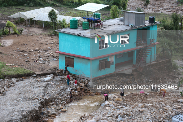 A view of the house damaged by the flood due to heavy rain in a village in Lalitpur district on the outskirts of Kathmandu, Nepal, on Octobe...