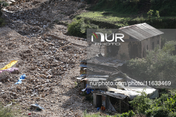 A view of the house damaged by the flood due to heavy rain in a village in Lalitpur district on the outskirts of Kathmandu, Nepal, on Octobe...