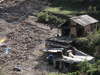 A view of the house damaged by the flood due to heavy rain in a village in Lalitpur district on the outskirts of Kathmandu, Nepal, on Octobe...