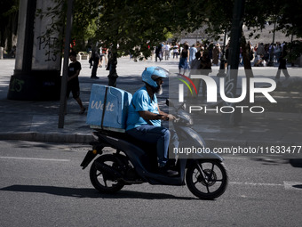 A Wolt delivery driver rides his motorcycle in the center of Athens, Greece, on October 3, 2024. Wolt is the second most popular delivery co...