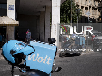 Two Wolt delivery motorcycles are in the center of Athens, Greece, on October 3, 2024. Wolt is the second most popular delivery company in G...