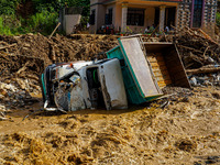 Flooding from the Salamdo River sweeps and damages a vehicle in Patikharka, Kavrepalanchok District, Nepal, on October 3, 2024. (