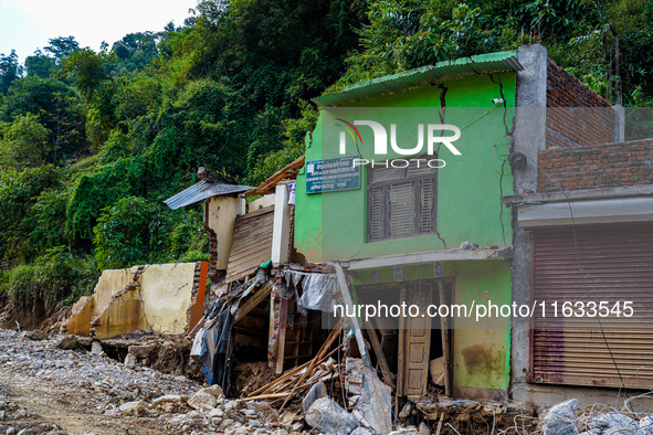 Salamdo River flooding damages homes in Patikharka of Kavrepalanchok District, Nepal, on October 3, 2024. Homes are severely damaged, with m...