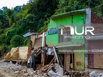 Salamdo River flooding damages homes in Patikharka of Kavrepalanchok District, Nepal, on October 3, 2024. Homes are severely damaged, with m...