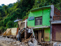 Salamdo River flooding damages homes in Patikharka of Kavrepalanchok District, Nepal, on October 3, 2024. Homes are severely damaged, with m...