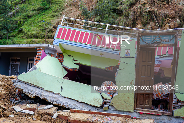 Salamdo River flooding damages homes in Patikharka of Kavrepalanchok District, Nepal, on October 3, 2024. Homes are severely damaged, with m...