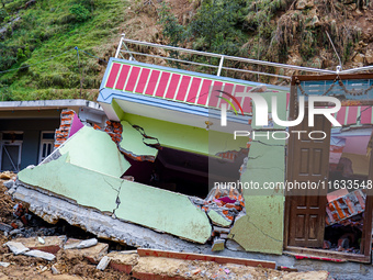 Salamdo River flooding damages homes in Patikharka of Kavrepalanchok District, Nepal, on October 3, 2024. Homes are severely damaged, with m...