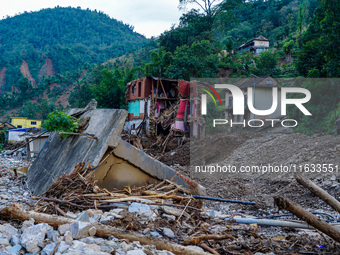 Salamdo River flooding damages homes in Patikharka of Kavrepalanchok District, Nepal, on October 3, 2024. Homes are severely damaged, with m...