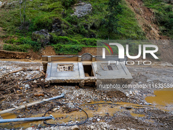 Salamdo River flooding damages homes in Patikharka of Kavrepalanchok District, Nepal, on October 3, 2024. Homes are severely damaged, with m...