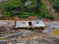 Salamdo River flooding damages homes in Patikharka of Kavrepalanchok District, Nepal, on October 3, 2024. Homes are severely damaged, with m...