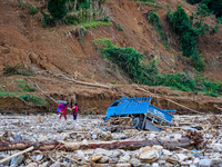 Due to heavy rainfall, the Salamdo River flood damages the road in Patikharka, Kavrepalanchok District, Nepal, on October 3, 2024. People ha...