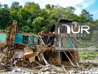 Salamdo River flooding damages homes in Patikharka of Kavrepalanchok District, Nepal, on October 3, 2024. Homes are severely damaged, with m...