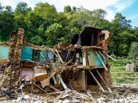 Salamdo River flooding damages homes in Patikharka of Kavrepalanchok District, Nepal, on October 3, 2024. Homes are severely damaged, with m...