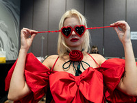 Models get ready backstage before walking on the runway during Day 2 of Bangkok International Fashion Week at Siam Paragon in Bangkok, Thail...