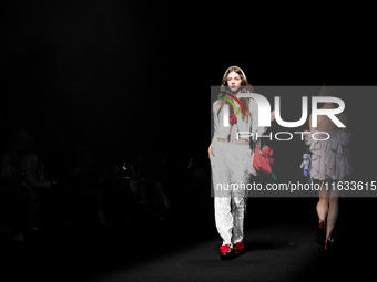 Models showcase creations by TandT on the runway during Day 2 of Bangkok International Fashion Week at Siam Paragon in Bangkok, Thailand, on...