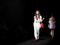 Models showcase creations by TandT on the runway during Day 2 of Bangkok International Fashion Week at Siam Paragon in Bangkok, Thailand, on...