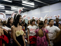 Models wear bunny ears and celebrate after showcasing creations by TandT on the runway during Day 2 of Bangkok International Fashion Week at...