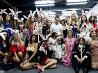 Models wear bunny ears and celebrate after showcasing creations by TandT on the runway during Day 2 of Bangkok International Fashion Week at...