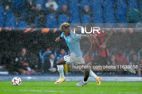 Fisayo Dele-Bashiru of SS Lazio and Moise Bombito of OCG Nice compete for the ball during the UEFA Europa League 2024/25 League Phase MD2 ma...