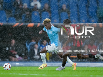 Fisayo Dele-Bashiru of SS Lazio and Moise Bombito of OCG Nice compete for the ball during the UEFA Europa League 2024/25 League Phase MD2 ma...