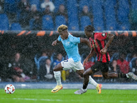 Fisayo Dele-Bashiru of SS Lazio and Moise Bombito of OCG Nice compete for the ball during the UEFA Europa League 2024/25 League Phase MD2 ma...