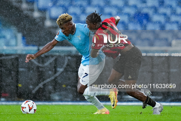 Fisayo Dele-Bashiru of SS Lazio and Moise Bombito of OCG Nice compete for the ball during the UEFA Europa League 2024/25 League Phase MD2 ma...