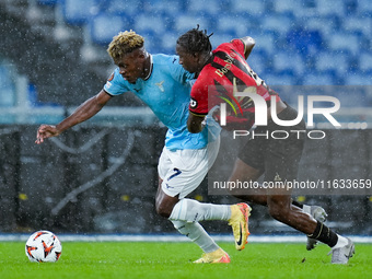 Fisayo Dele-Bashiru of SS Lazio and Moise Bombito of OCG Nice compete for the ball during the UEFA Europa League 2024/25 League Phase MD2 ma...