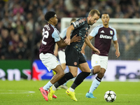 Harry Kane centre-forward of Bayern Munich and England and Ian Maatsen left-back of Aston Villa and Netherlandscompete for the ball during t...