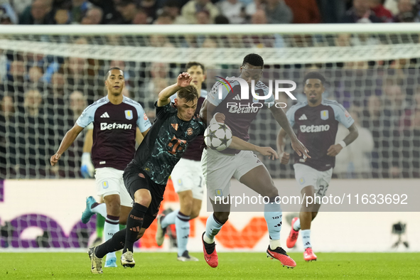 Jhon Duran centre-forward of Aston Villa and Colombia and Joshua Kimmich central midfield of Bayern Munich and Germany compete for the ball...