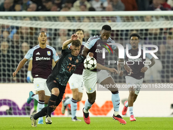 Jhon Duran centre-forward of Aston Villa and Colombia and Joshua Kimmich central midfield of Bayern Munich and Germany compete for the ball...