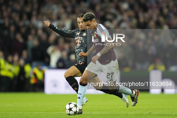 Morgan Rogers attacking midfield of Aston Villa and England and Leroy Sane right winger of Bayern Munich and Germany compete for the ball du...