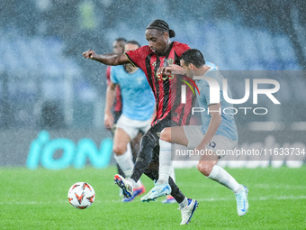 Pablo Rosario of OGC Nice and Pedro of SS Lazio compete for the ball during the UEFA Europa League 2024/25 League Phase MD2 match between SS...